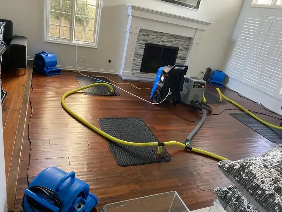 Air movers and a dehumidifier drying an Agoura Hills, CA home interior